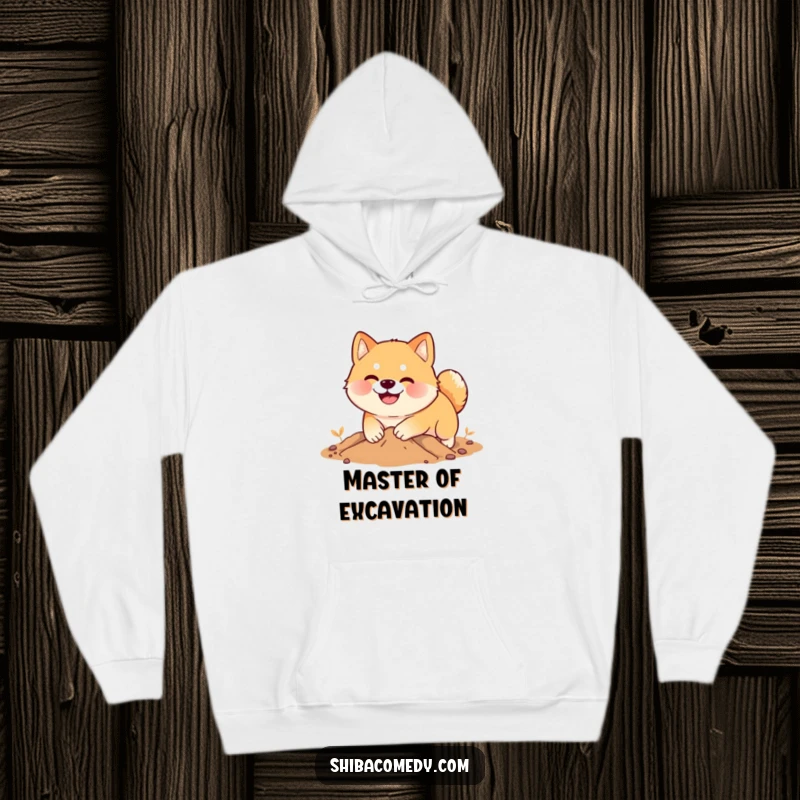 Funny Shiba Inu hoodie, a smiling dog digs enthusiastically in soft earth, cozy humorous sweatshirt.
