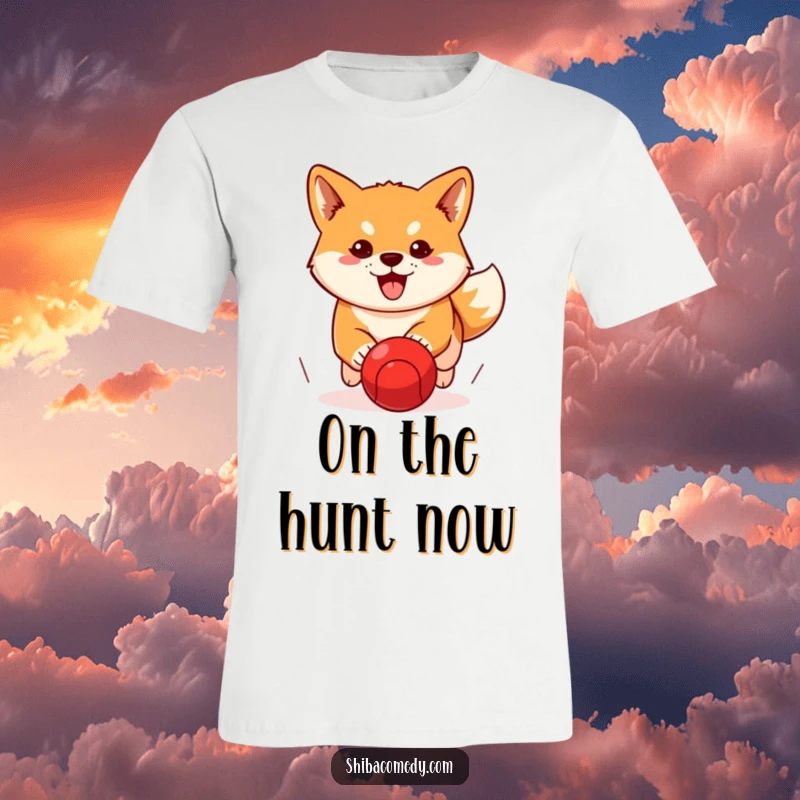 Funny Shiba Inu t-shirt depicting a determined dog chasing a red ball, showcasing focus and humorous ambition.
