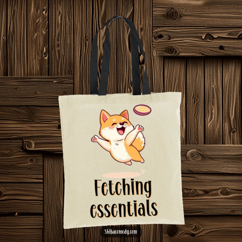 Funny Shiba Inu dog character leaping to catch a frisbee on a tote bag, perfect for carrying essentials with sporty flair.
